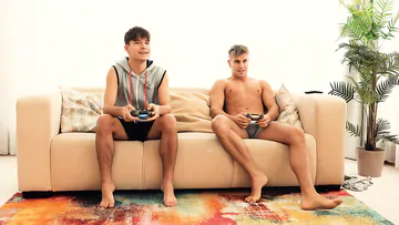 Guys on a sofa bareback fucks