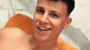 Muscular boy wanking and cums