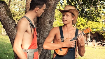Two guys fucking on a porch