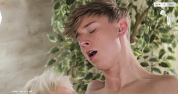 Gay boys fucking on a sofa