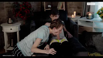 Twinks having sex on a chair