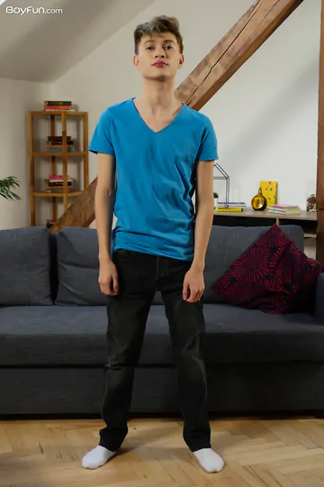 Cute blonde boy getting naked