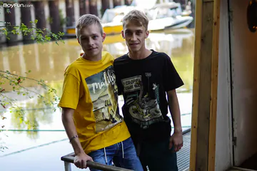 Cute blonde boys in action