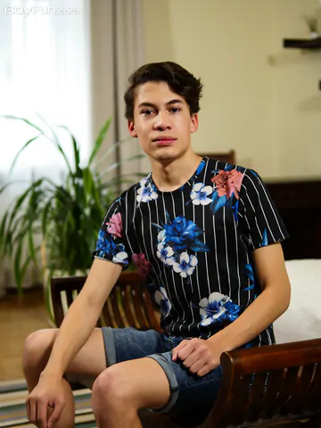 Cute boy with a curved cock