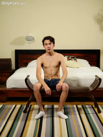 Cute boy with a curved cock