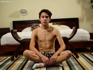 Cute boy with a curved cock