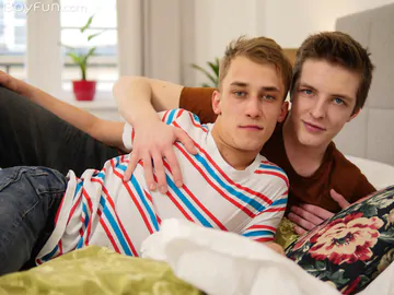 Two boys bareback fucking in bed