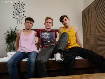 Two hot guys fucking a redhead