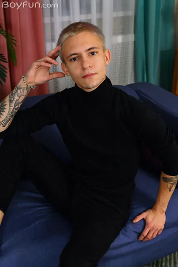 Tattooed boy with a very nice cock