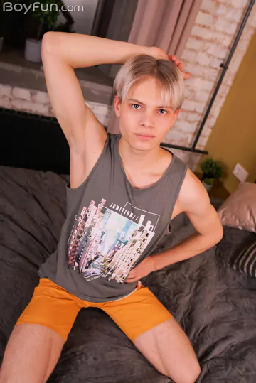 Blonde boy with a smooth shaved cock