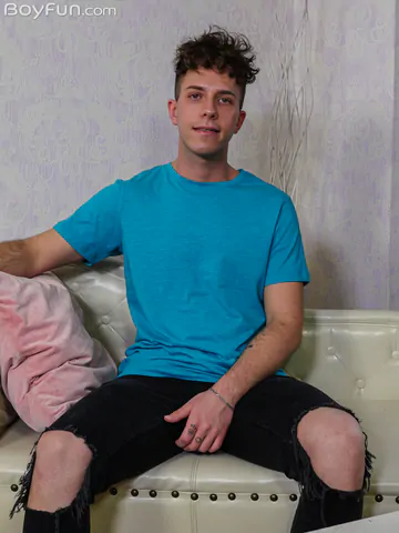 Curly haired guy showing his dick