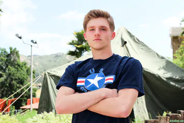 Cute twink showing shaved cut cock