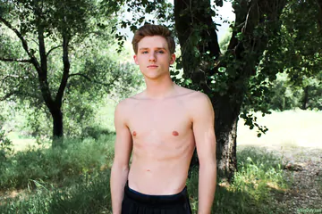 Cute twink showing shaved cut cock