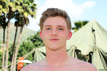 Cute twink showing shaved cut cock