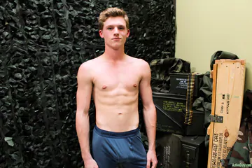 Cute twink showing shaved cut cock