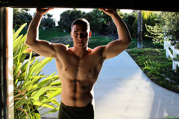 Stud with a dildo in his ass