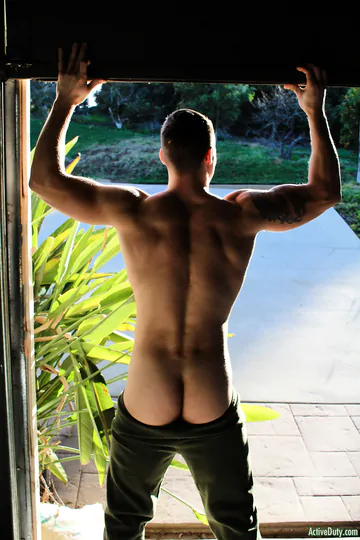 Stud with a dildo in his ass