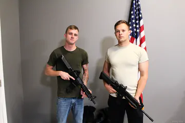 Hot guys with guns having sex