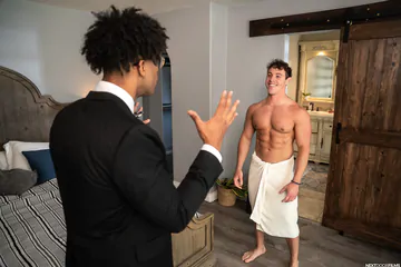 Guys having an interracial threesome