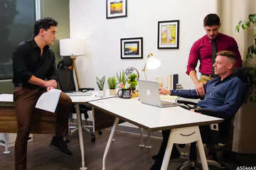 Three guys in an office boning