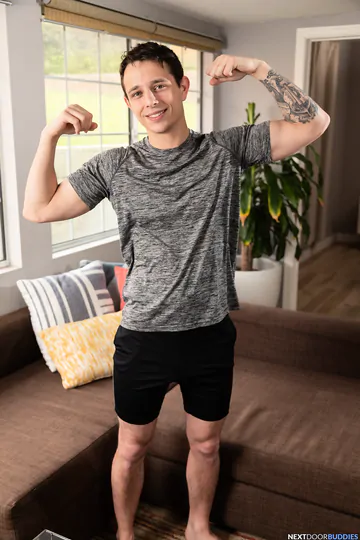 Two tattooed guys fucking