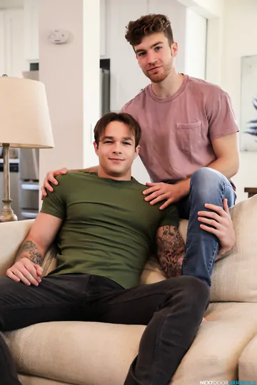 Guys on a sofa bareback fucking