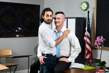 Guys in a classroom having sex