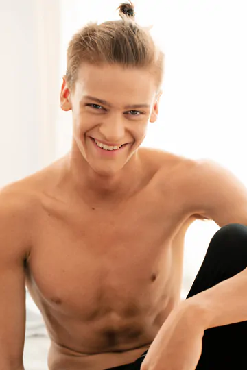 Handsome boy showing his goods