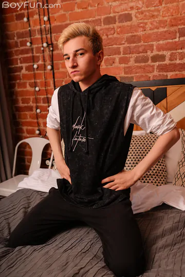 Fit twink with a smooth shaved cut cock