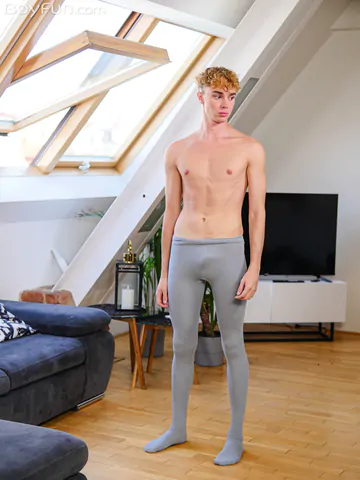 Handsome tall twink getting naked