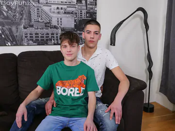 Two boys on a sofa having sex