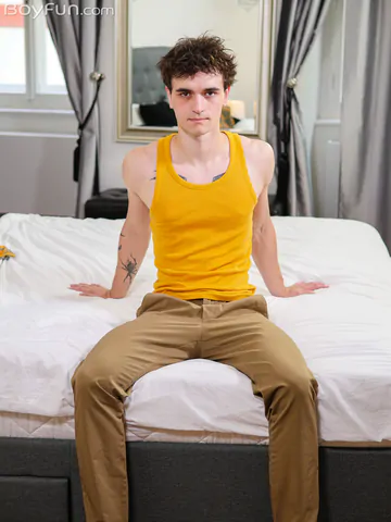 Tattooed guy showing dick and ass