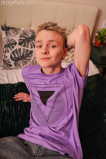 Skinny boy showing his asshole