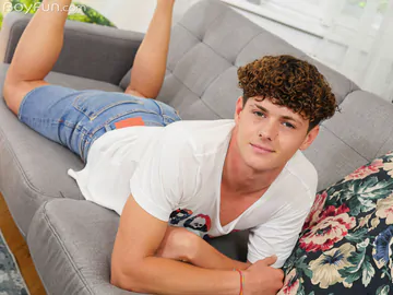 Cute curly boy showing dick and ass