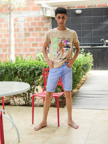 Slim Latin twink getting naked