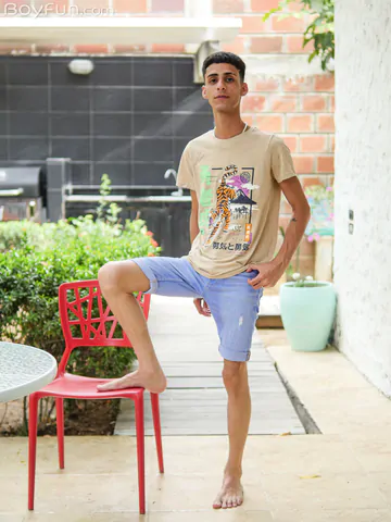 Slim Latin twink getting naked