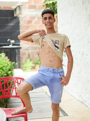 Slim Latin twink getting naked