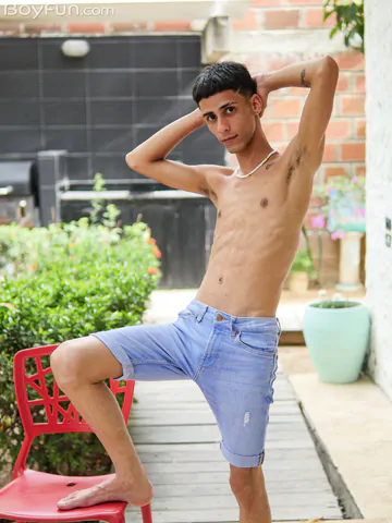 Slim Latin twink getting naked