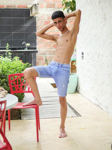 Slim Latin twink getting naked