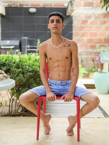 Slim Latin twink getting naked