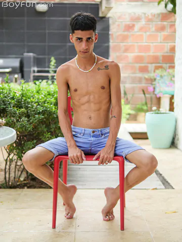 Slim Latin twink getting naked