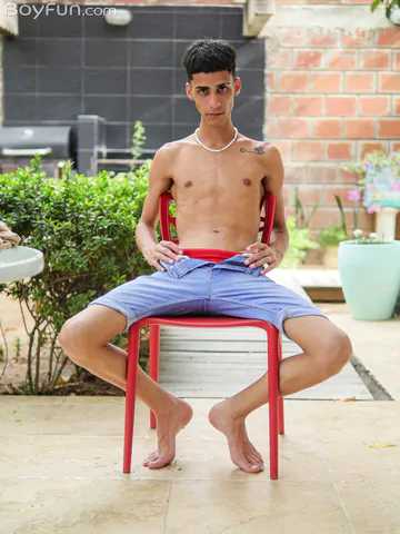 Slim Latin twink getting naked