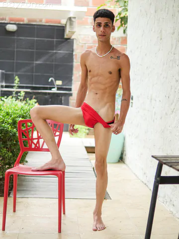 Slim Latin twink getting naked