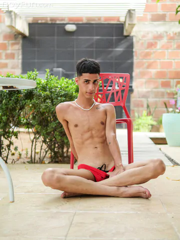 Slim Latin twink getting naked