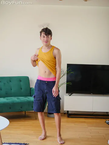 Gay twink getting naked for the cam