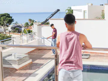 Latino boys banging on a sofa