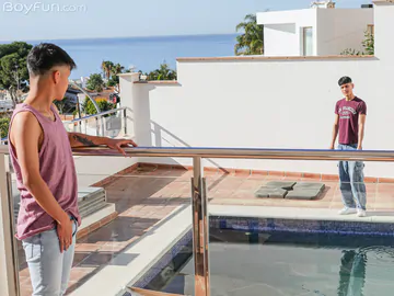 Latino boys banging on a sofa