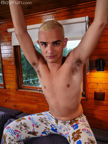 Boy with crazy eyes showing dick