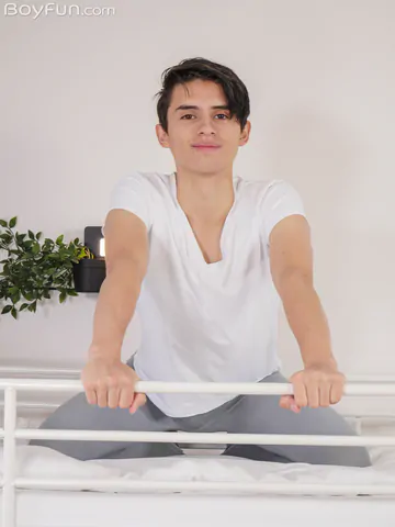 Handsome twink with a curved dick