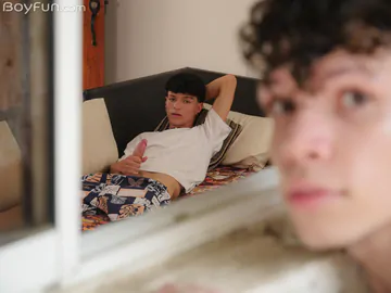 Three boys on a sofa having sex